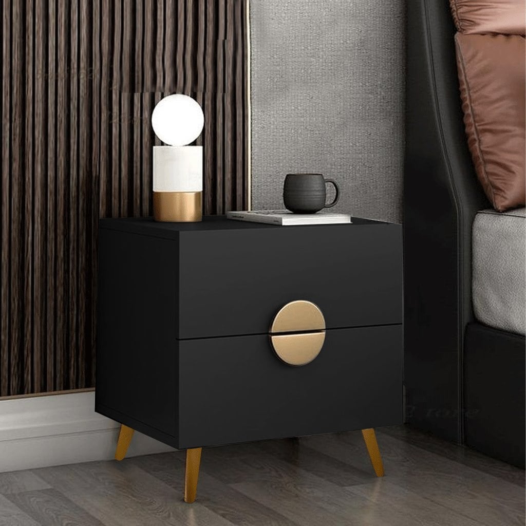 كومودينو مودرن أسود فاخر بأرجل ومقابض ذهبية Black modern nightstand with gold legs and circular handles